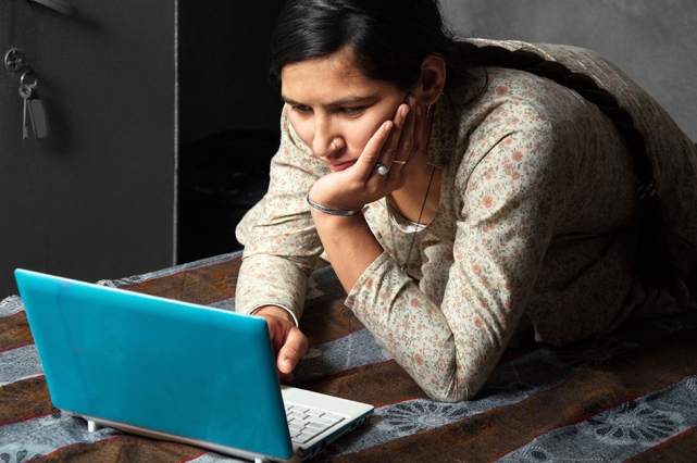 Women using a laptop computer.