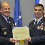 In a Pentagon ceremony, MIT Air Force ROTC Cadet Nicholas James is presented the Cadet of the Year Award by Air Force Vice Chief of Staff Gen. Stephen Wilson.