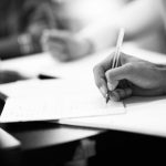 stock photo of a hand with a pen