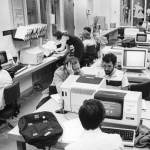 students sitting at computer workstations