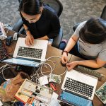 Jessica Shi ’17 (left) and Charlene Xia ’17 work during their senior year on a prototype for Tactile, a portable realtime text-to-Braille converter.