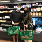 Caption:First-year students explore a new nonprofit grocery store in Central Square dedicated to providing low-cost, fresh, tasty, convenient and nutritious food.