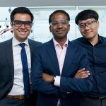 Caption:Karthish Manthiram (center) poses with two of his mentees.